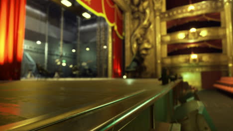 stage set up before a live performance at a historic theater in the evening