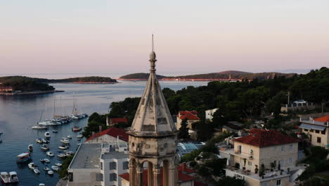 hvar bay and yachting harbor, island in dalmatia archipelago of croatia - aerial drone shot