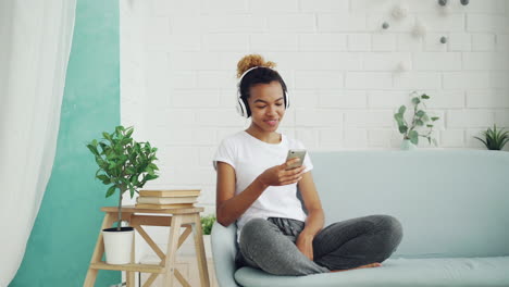 woman listening to music on phone
