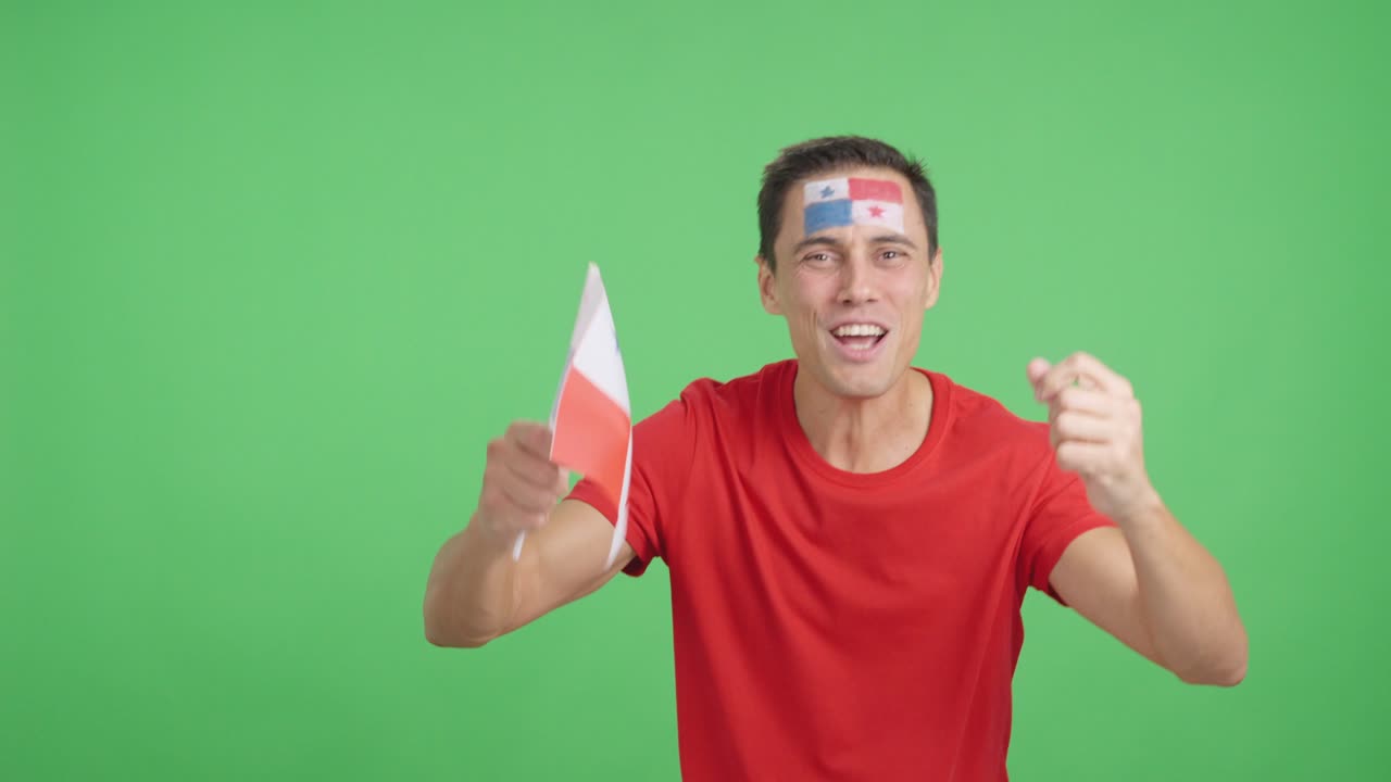 Man cheering for Panama screaming and waving a national flag