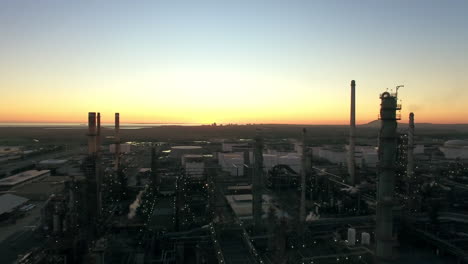 dawn over the refinery