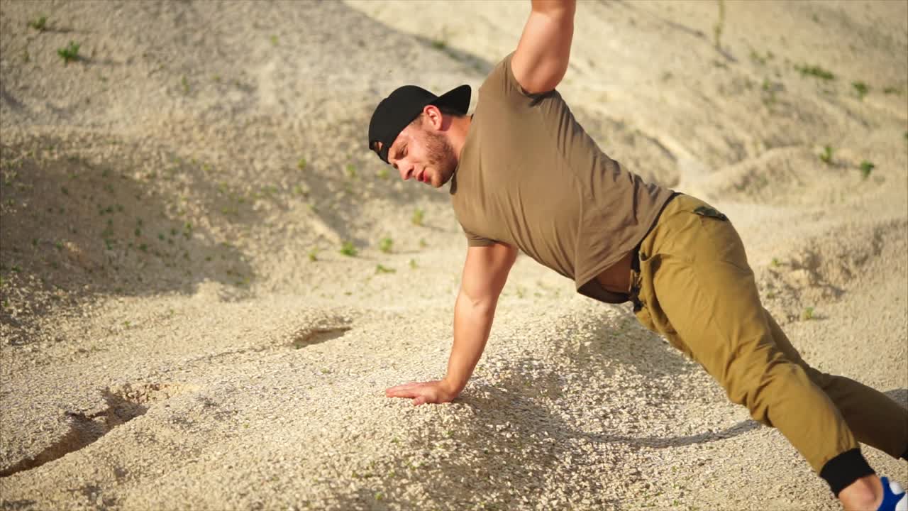 Man Doing Push-ups in a Quarry
