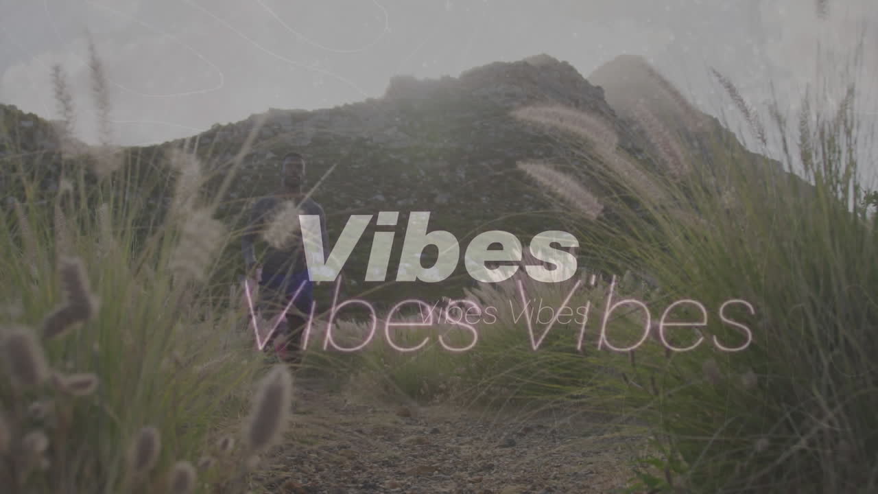 人が田舎でハイキングしている上で繰り返される白い振動の言葉のアニメーション