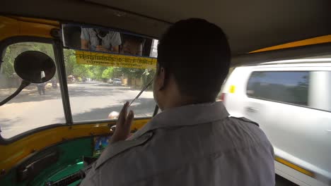 driver steering tuk tuk