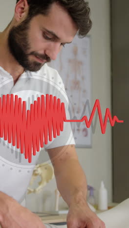 animation of heart over caucasian male massage therapist with female patient