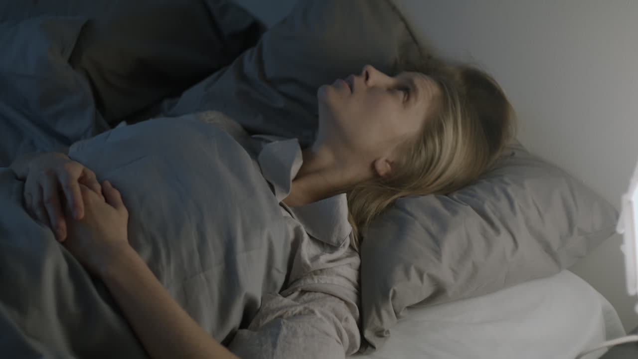 Woman Experiencing Sleep Difficulties