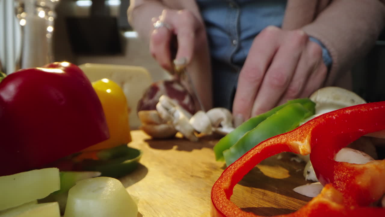 Preparing food with vegetables and salami