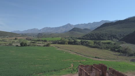 Drone-flies-low-over-desolate-house-on-farm-in-rural-South-Africa