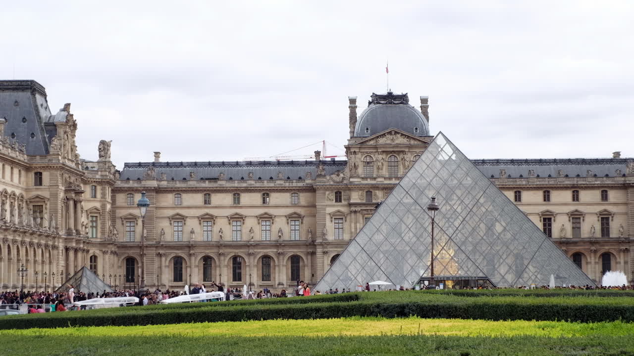 Paris, France - November 21, 2021: Front view of the Louvre Museum on a cloudy day