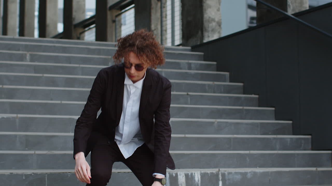 Upset businessman extremely upset holding reports of company work worried about future business