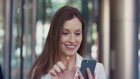 Portrait-of-Businesswoman-outside-corporate-office-building