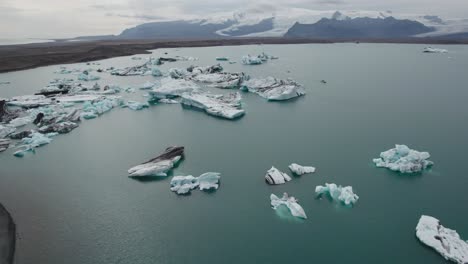 drone shot of the yokulsarlon glacier lake in iceland 10