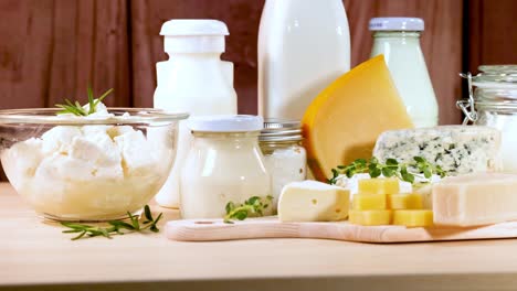 various dairy items displayed on a wooden surface