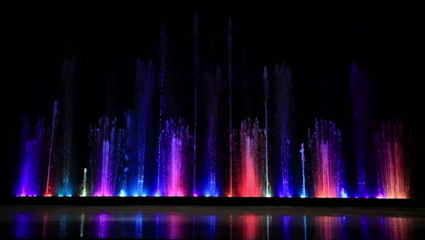 Dancing-colorful-fountain-with-reflection-in-the-ice