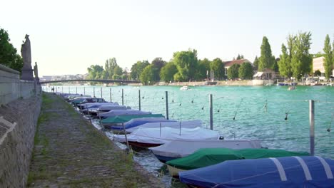 small boats on lake constance during sunny summer afternoon in lindau