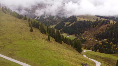 Spectacular-Austrian-autumn-fall-mountain-landscape-with-pine-trees-and-fog