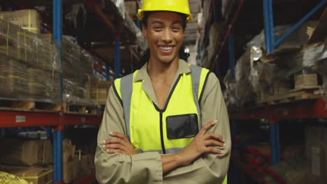 portrait of young female worker in a warehouse