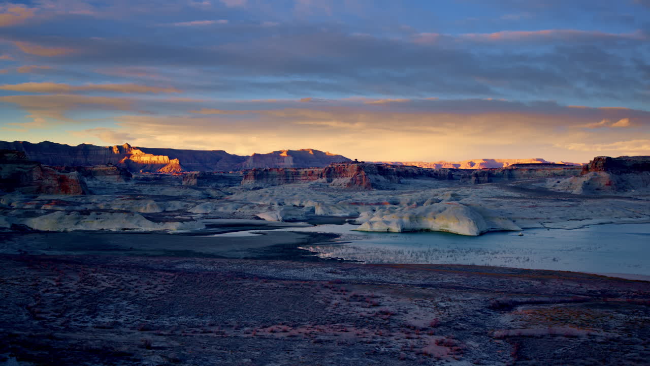 Drone shot approaching remarkable rock formations close to Lake Powell in Page, Arizona.