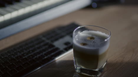 close-up of a hot latte on a desk