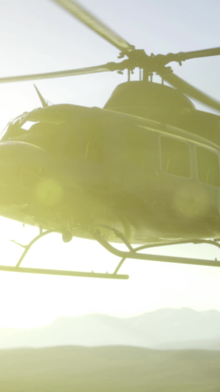 Flying over majestic landscapes at sunset with a helicopter adventure
