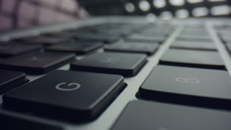 Black-keyboard-of-grey-laptop-computer.-Modern-laptop-computer-with-touchpad