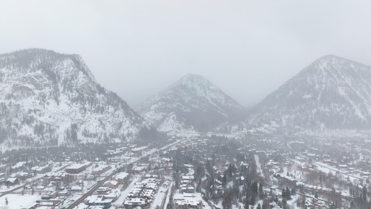 Frisco town covered in snow after snowstorm in Copper Mountain in Colorado, USA. Drone shot.