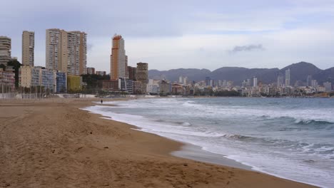 Waving-sea-water-near-modern-buildings