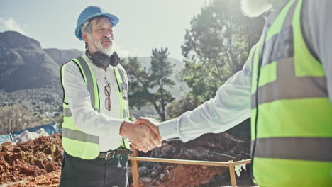 construction engineers shaking hands