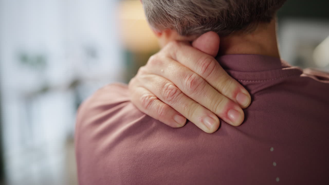 Person with neck and shoulder pain