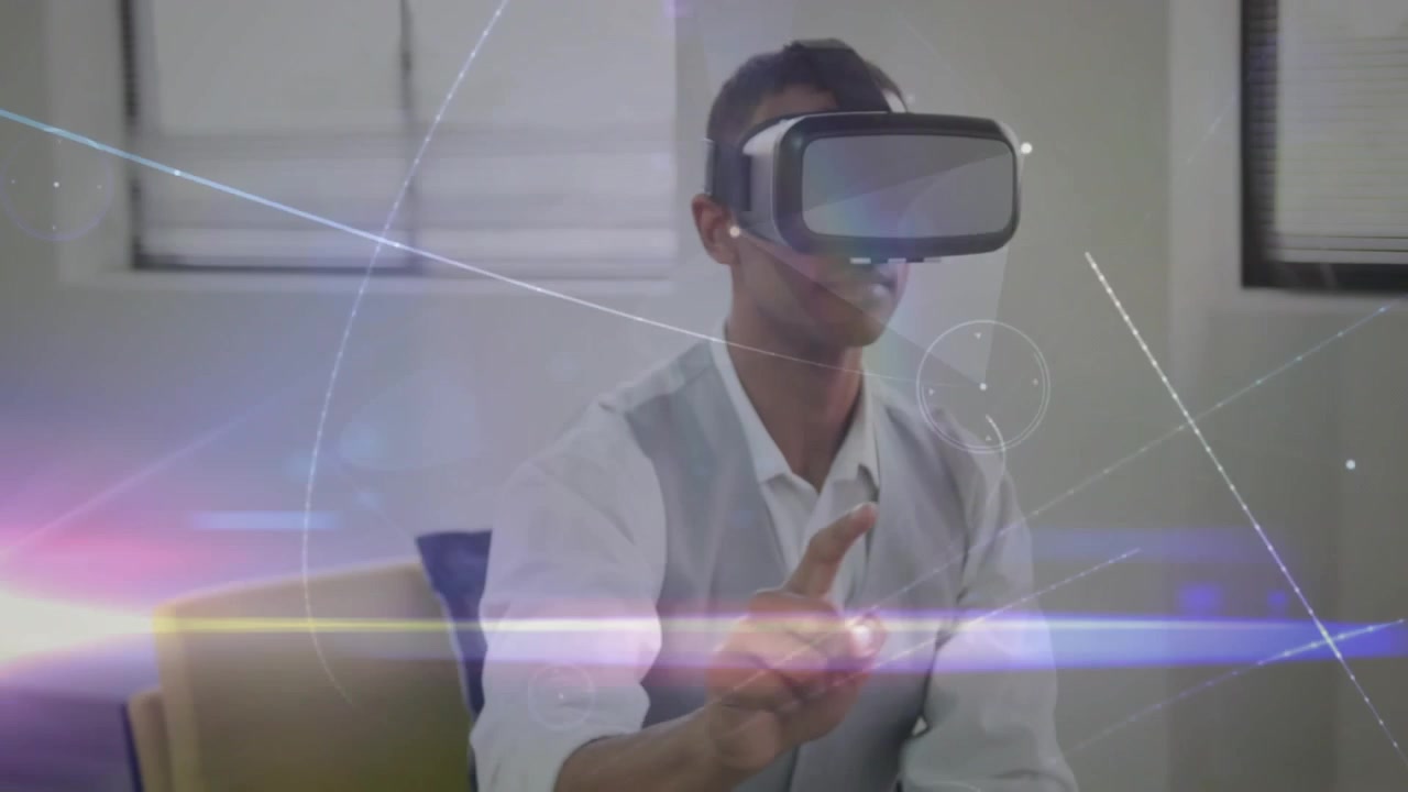 VR headset activating, man raising finger, tapping, pinching and swiping holograms to demo controls