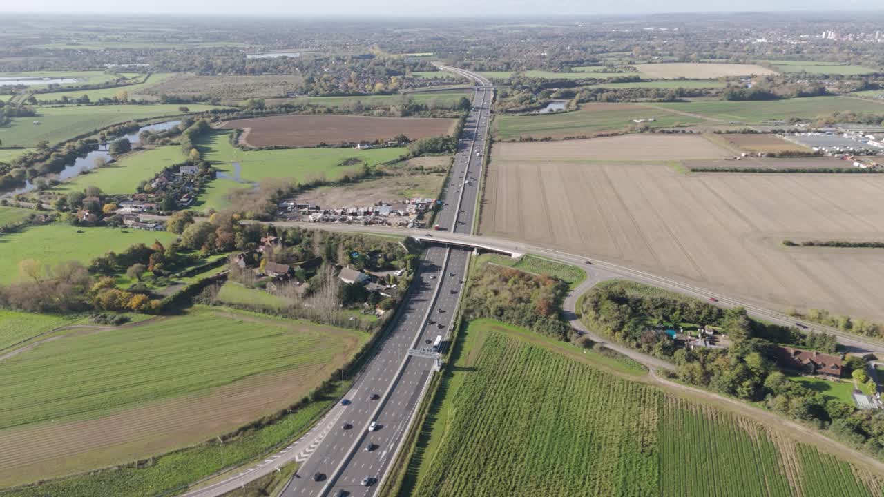 Aerial View of a Highway Crossing a Bridge in the English Countryside