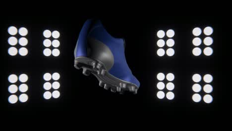 leather soccer boot on black background