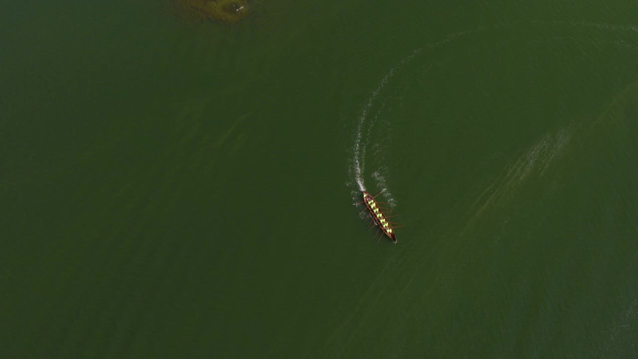Top down aerial of an old traditional wooden rowing boat in the finnish archipelago