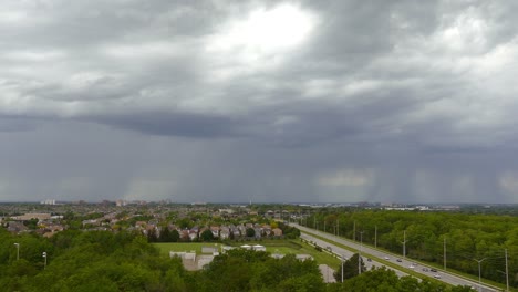 Time-lapse-of-rain-showering-over-landscape-around-Mississauga,-Canada