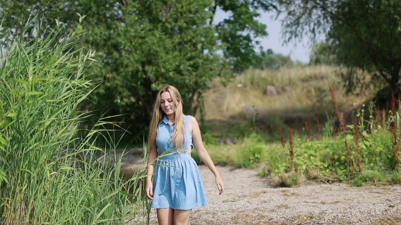 Couple Walking Near River. Happy couple walking near lake or river, having fun together