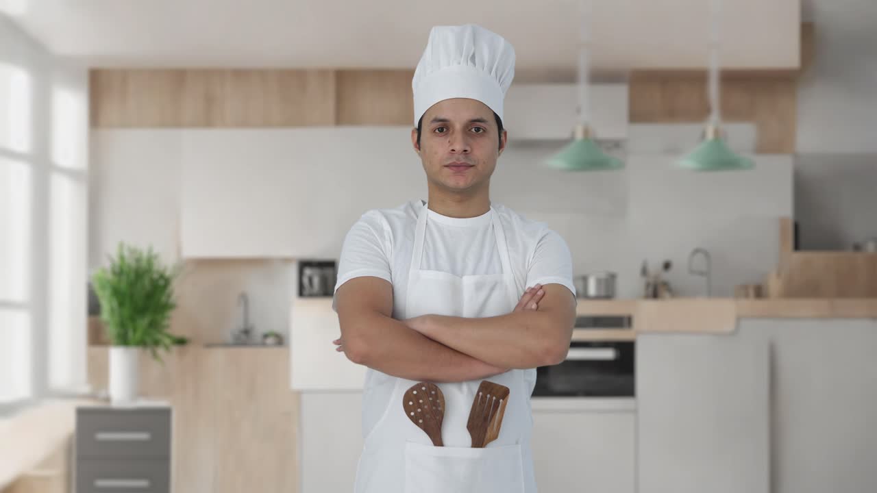 retrato de un cocinero profesional indio confiado