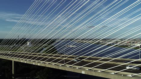 bridge: drone shot: dames point bridge: parallel to the bridge