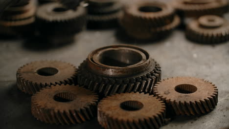 rusty gears and a hand in a glove