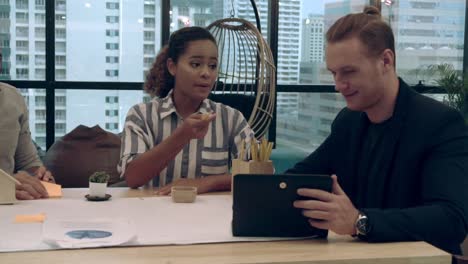 creative business people group having conversation at office desk in workplace.