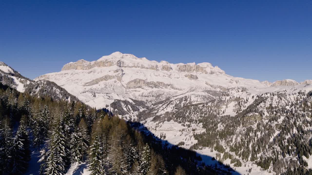 Above Sass Pordoi Across The Arabba Steep Mountains In The Dolomites, Italy. Aerial Shot