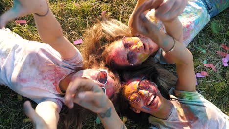 friends celebrating a colorful festival