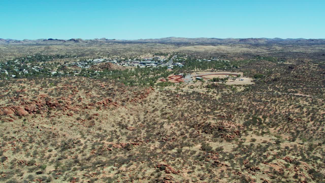 Aerial view towards the Arunga Park Speedway, in Stuart, north of Alice Springs, Mparntwe, Northern Territory, Australia. August 2022.