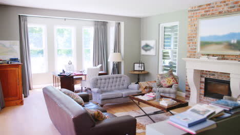 empty furnished sitting room in a family home, panning shot