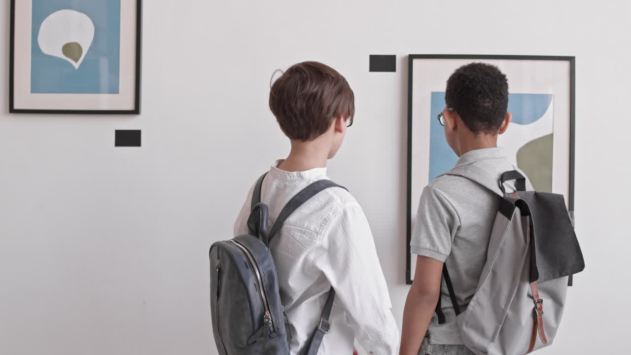 Boys Observing Paintings in Gallery