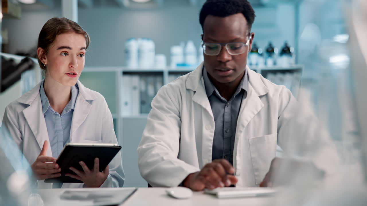 Scientists collaborating in a lab