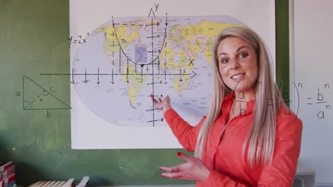 Animation-of-mathematical-equations-over-caucasian-female-teacher-teaching-geography-at-school
