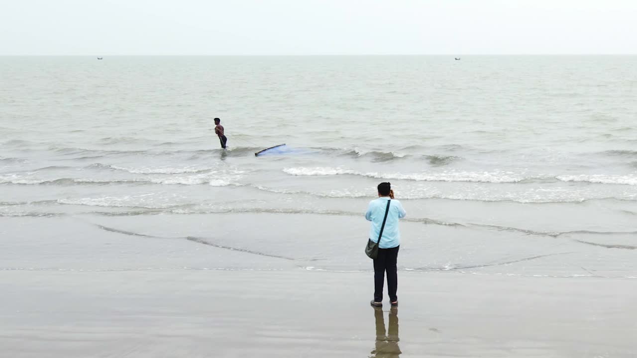 Photographer's lens on traditional Net Fishing at Kuakata sea beach, Bangladesh
