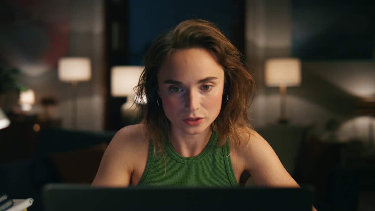 Authoritative woman explaining home closeup. Serious girl talking video call