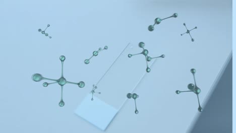 animation of floating nucleotides over transparent chip on desk