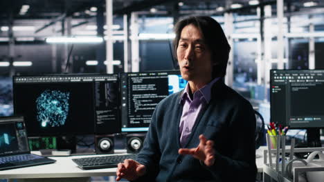 data center admin waving hand, filming presentation tour, showcasing ai